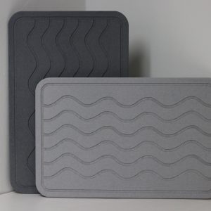 GLAW™ Ishi Mats that are dark and light grey in color on display