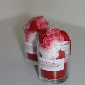 Strawberry Sundae candles that are strawberry scented. Made with soy wax, bee wax and a cotton wick that burns for a long time.