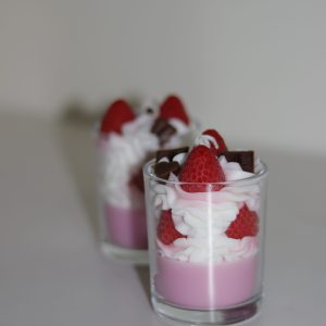 Strawberry & Chocolate candles that are chocolate scented. Made with soy wax, bee wax and a cotton wick that burns for a long time.