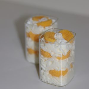 Mandarin candles that are Citrus Mandarin scented. Made with soy wax, bee wax and a cotton wick that burns for a long time.