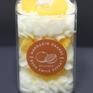 Mandarin candles that are Citrus Mandarin scented. Made with soy wax, bee wax and a cotton wick that burns well with no toxins.